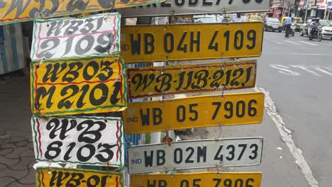 Video-of-a-stack-of-automobile-registration-plates-is-painted-in-a-Kolkata-roadway-in-this-video
