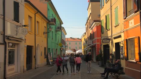 Daytime-Scene-Of-Tourists-And-Locals-In-The-Street-With-Colorful-Houses-In-The-Old-Town-Of-Cesenatico-In-Italy