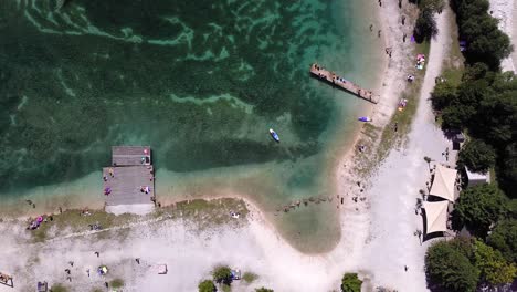 Top-down-shot-of-people-on-a-lake-in-summer-time
