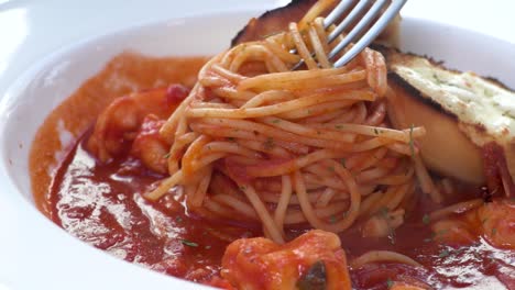 A-Bowl-of-shrimp-pasta-being-eaten