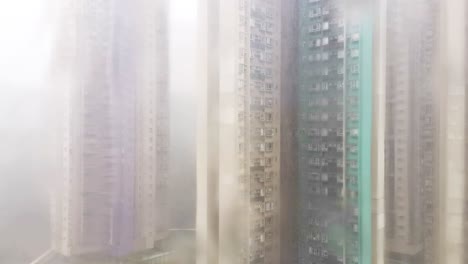 Dreamlike-in-the-rain,-high-rise-buildings-in-the-city