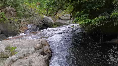 Flowing-water-from-waterfall-at-Little-Hawaii-Trail,-Tseung-Kwan-O,-Hong-Kong