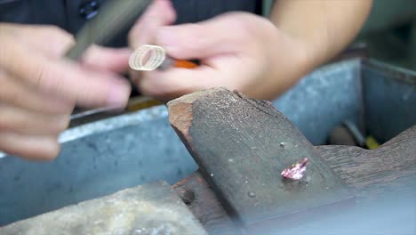 Metal-jewelry-manufacturing,-professional-handmade-ring-shaping-by-file,-matching-to-diamond