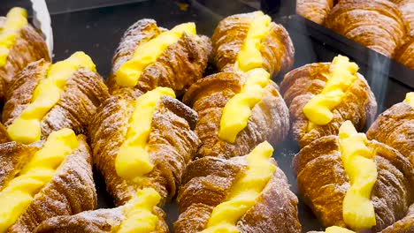 Japan-fashionable-dessert,-fresh-delicious-sugar-pudding-mini-croissant-selling-in-bakery