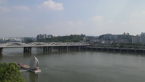 Aerial-flyover-of-the-Hangang-Bridge-and-Han-River-in-Seoul,-South-Korea