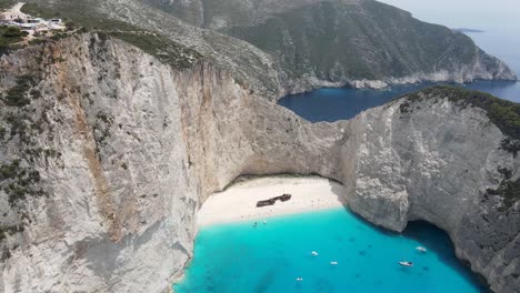 Panoramic-view-from-the-top-of-a-stranded-ship-in-the-beautiful-beach-of-Navagio,-Zakynthos,-Greece