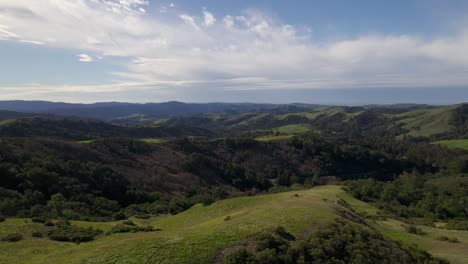 Drone-trucking-right-across-rolling-Northern-California-hills-during-golden-hour