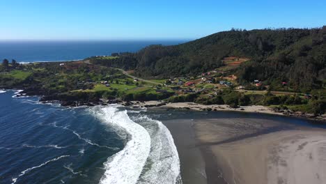 location-in-Valdivia,-beach-area-with-a-a-river,-perfect-place-to-surf-and-bird-watching