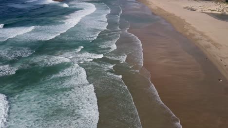 Aerial-side-walk-across-a-beatiful-beach-in-the-north-of-Galicia