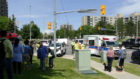 Paramedics-and-emergency-vehicles-at-a-car-crash,-Mississauga,-Canada