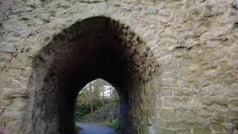 Tilt-down-shot-on-Reigate-Castle-and-entering-trough-the-tunnel