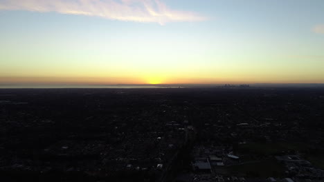 Smooth-accent-of-Melbourne-suburbans-and-city-in-the-distance-and-the-sun-sets-over-the-graceful-city