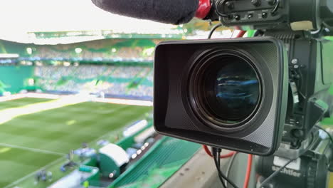 Lens-Of-Professional-Video-Camera-At-Soccer-Stadium-To-Broadcast-Champion-Game