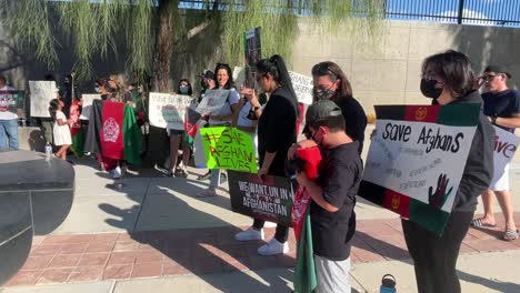 Protesters-holding-signs-to-support-Afghanistan