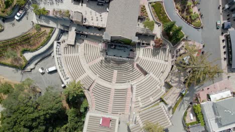 Aerial-drone-view-rotating-above-the-concert-bowl-and-the-mountain-winery-in-Saratoga,-California,-USA