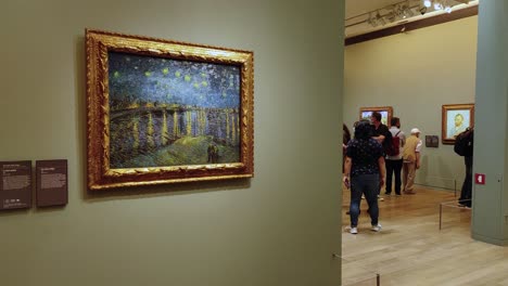 Van-gogh-painting-le-louvre-inside-Orsay-museum-gallery-in-Paris