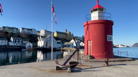 Ålesund-Harbor-and-Molja-Lighthouse,-on-a-beautiful-sunny-summer-day,-with-calm-seas-and-light-wind,-Norway