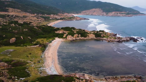 Aerial-static-view-over-polluted-beach-in-Ninh-Thuan,-next-to-Nui-Chua-national-park