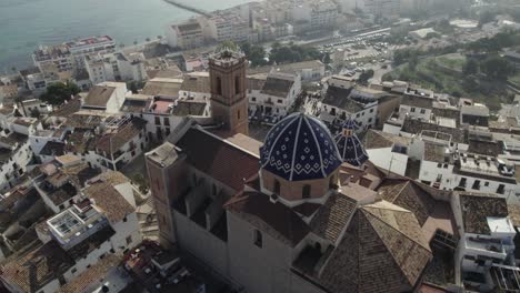 Aerial-view-above-Church-of-Our-Lady-of-Consuelo-in-Altea,-panoramic-city-view