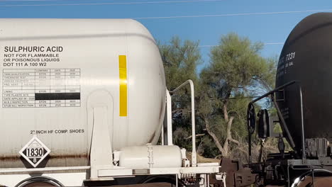 Closeup-of-cargo-train-passing-by