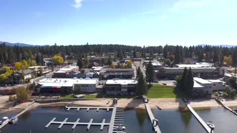 Side-scrolling-aerial-of-McCall,-Idaho-and-all-of-its-rural-amenities