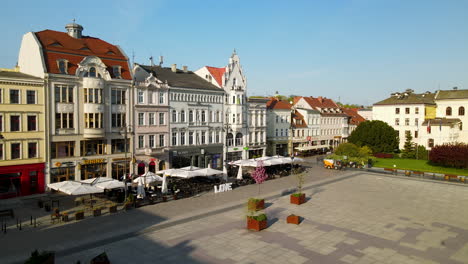 Aerial-view-of-empty-old-market-square-in-Bydgoszcz-during-sunny-day-and-blue-sky