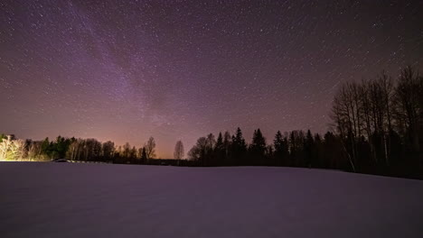 Magical-night-lapse-of-stars-as-they-orbit-in-the-vibrant-polar-night-sky