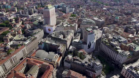 Downtown-Buildings-and-Streets-of-Metropolitan-Urban-City-of-Milan,-Italy---Aerial
