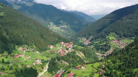 aerial-panoramic-landscape-view-of-a-beautiful-mountain-village-in-Uzungol-Trabzon-on-a-sunny-summer-day-in-Turkey