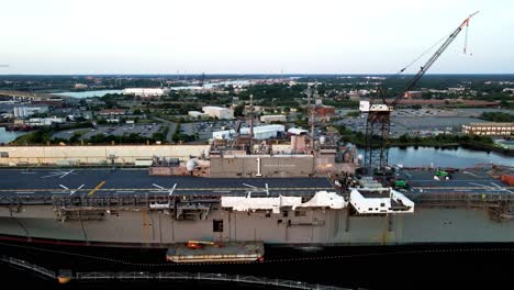 Aerial-View-Of-Aircraft-Carrier-Docked-At-General-Dynamics-Nassco-Shipyard