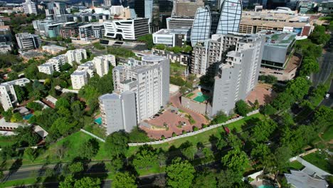 sunny-afternoon-in-Sandton-city-financial-centre-of-Johannesburg-in-South-Africa,-aerial