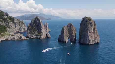 Gorgeous-Scenery-of-Faraglioni-Arch-Rock-Formation-on-Island-of-Capri,-Italy