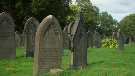 Horizontal-pan-of-cemetery-gravestones