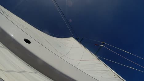 Sailboat-approaching-and-sails-of-a-sailboat