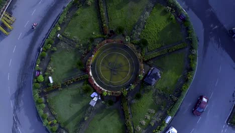 Rotating-Drone-Footage-of-a-4-Way-Circular-Road-Intersection-of-live-traffic