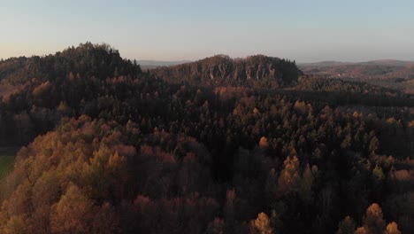 AERIAL:-Beautiful-Landscape-of-Saxon-Switzerland-in-autumn-with-forest-and-sandstone-rocks