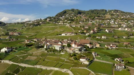 Aerial-closing-in-and-orbiting-Grandvaux-village