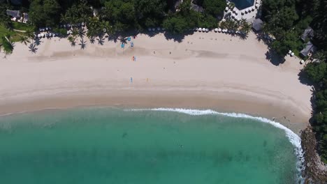 Top-down-aerial-shot-of-Surin-Beach-on-Phuket-in-Thailand