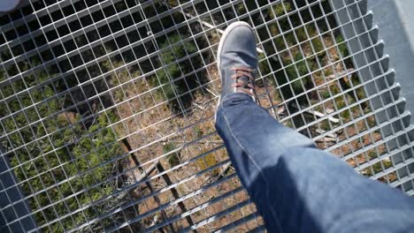 Bad-Wildbad,-Germany---Walking-across-a-hanging-bridge-in-Bad-Wildbad-in-the-Black-Forest