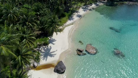 Fast-fly-over-of-a-perfect-tropical-private-beach-in-Asia