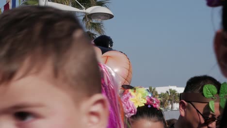An-excited-costumed-crowd-cheering-and-happy-at-the-Paphos-Carnival