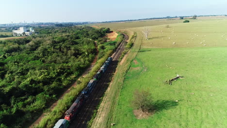 Aerial-video-of-a-train-in-movement-at-Indaiatuba,-Sao-Paulo,-Brazil