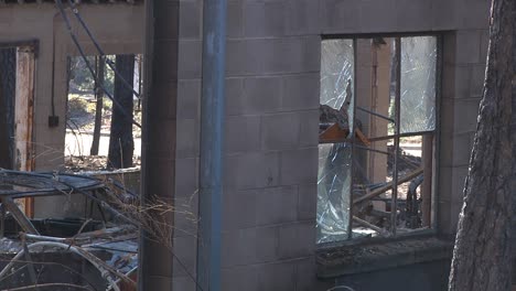 Camp-Fire-Aftermath-Burned-Building-With-Broken-Windows