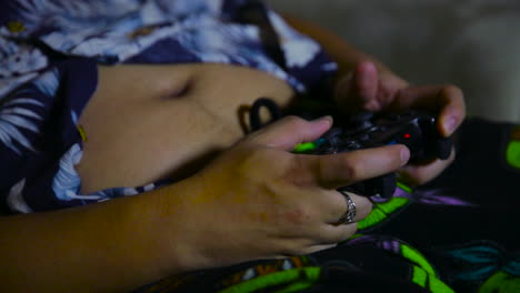 Man's-hands-holding-a-video-game-controller