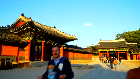 Seoul-South-Korea---Circa-A-panning-timelapse-shot-of-people-visiting-korean-tourist-attraction-and-unesco-heritage-Changdeokgung-Palace-in-Seul,-Korea