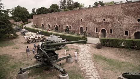 Tourists-viewing-the-artillery-in-Belgrade,-Serbia