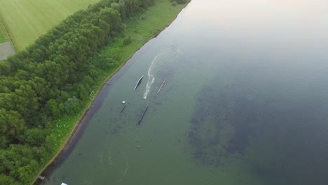 Aerial:-Wakeboard-cable-park-and-small-recreational-harbour-in-the-Veerse-Meer,-the-Netherlands