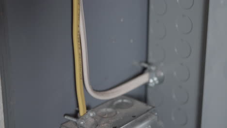 Wires-by-Circuit-Breaker-Going-into-Box-with-Switch-CLOSE-UP-TILT-UP