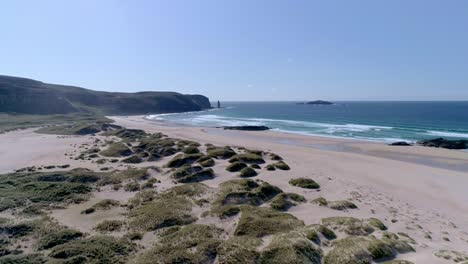 Rotating-aerial-arcing-from-south-to-north-of-the-amazing-remote-Sandwood-Bay,-Sutherland,-Scotland