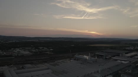 Drone-Shot-of-Göttingen-Industry-at-Sunset,-Lower-Saxony,-Germany,-Europe